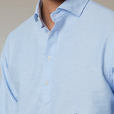 POLERA OXFORD CELESTE