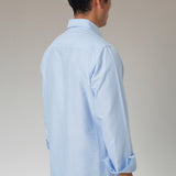 POLERA OXFORD CELESTE