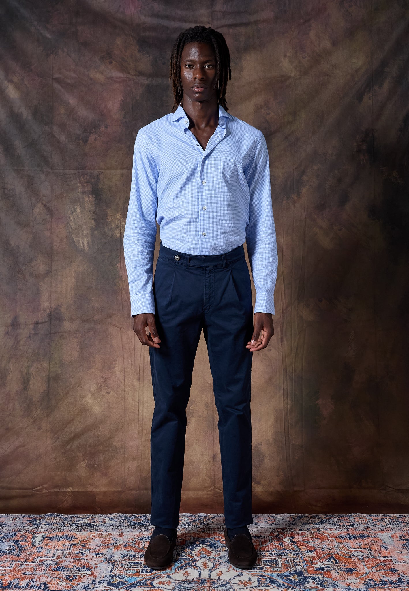 NAVY PLEATED CHINO TROUSERS