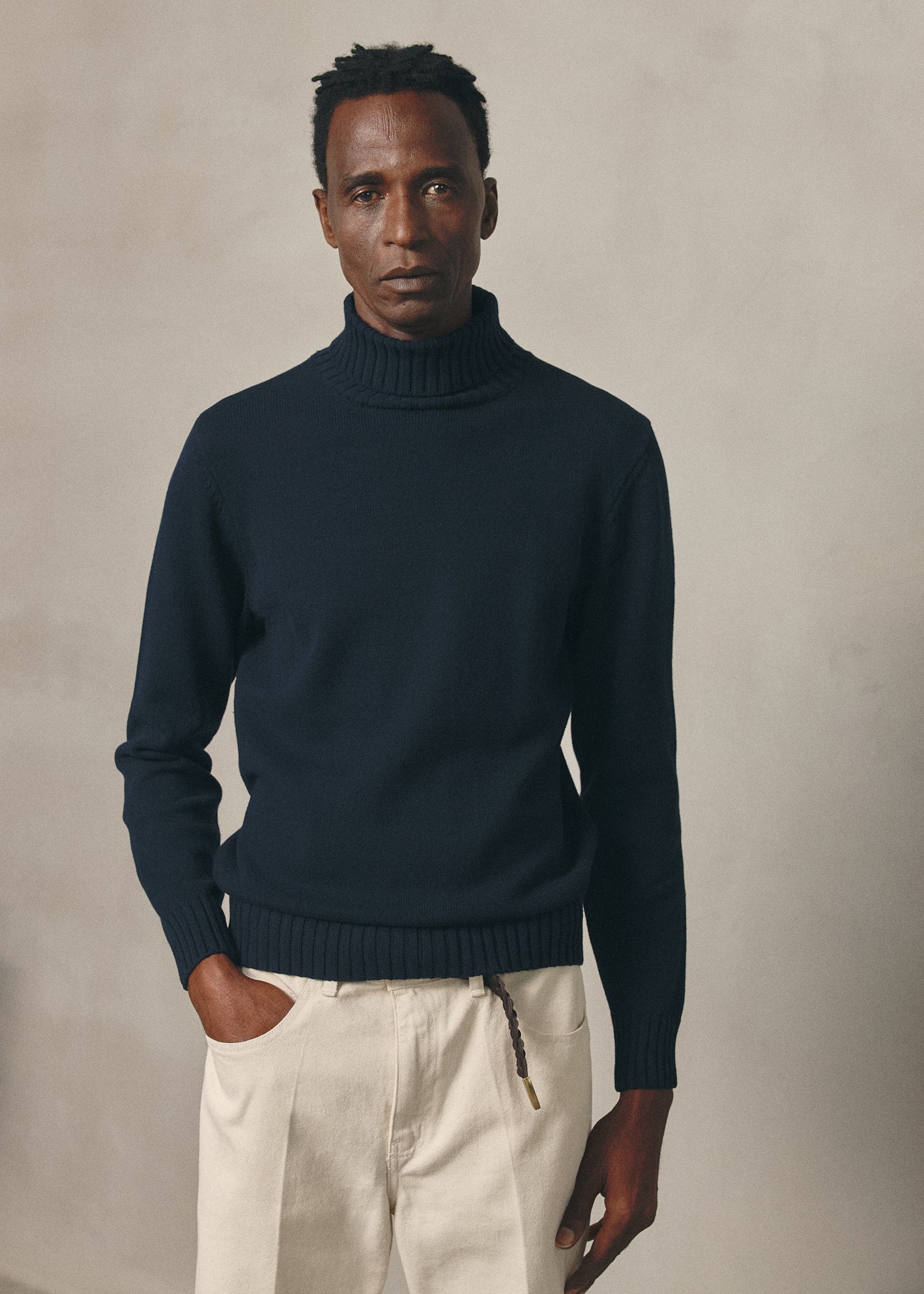 NAVY ROLL NECK JUMPER