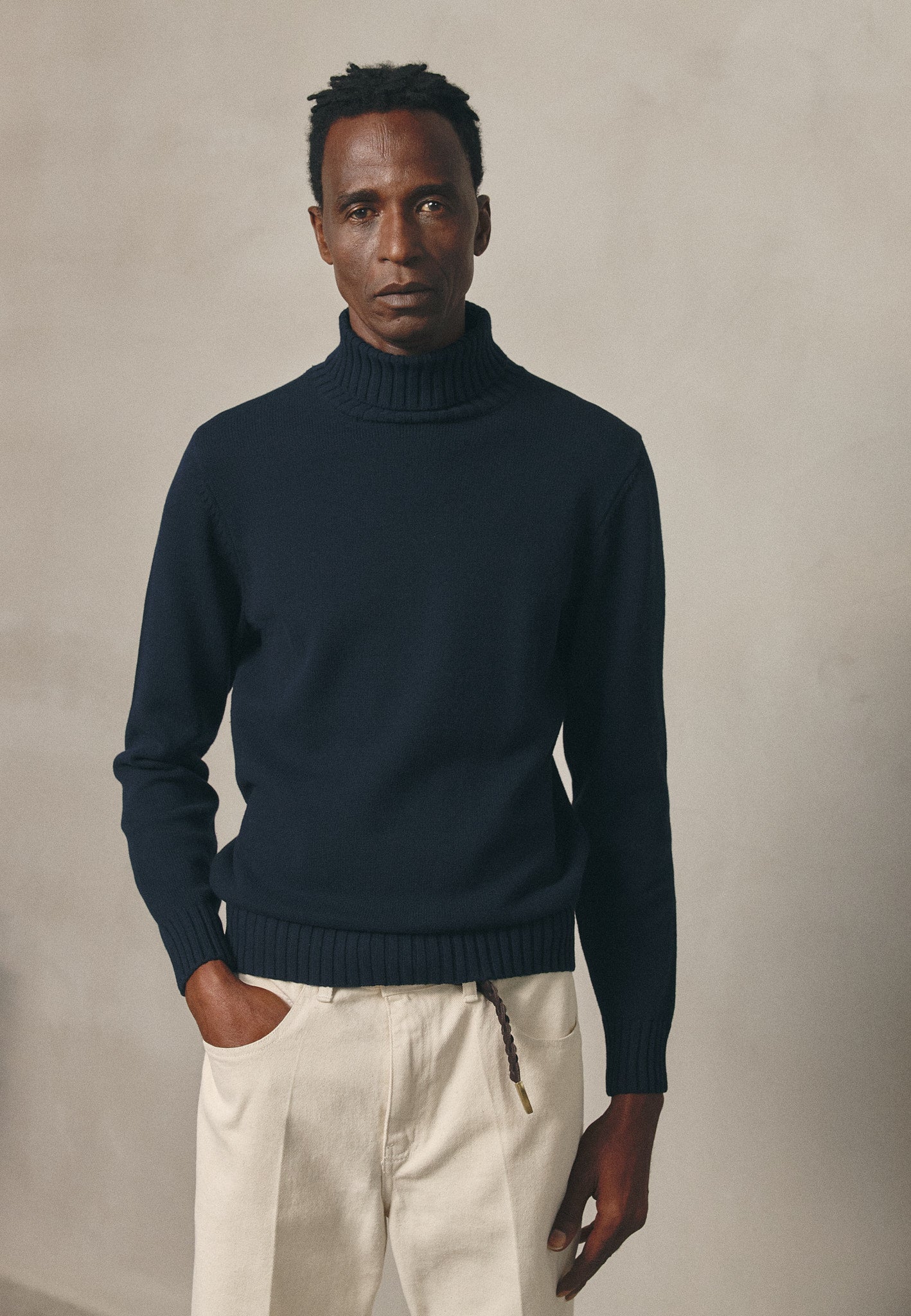 NAVY ROLL NECK JUMPER