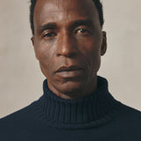NAVY ROLL NECK JUMPER