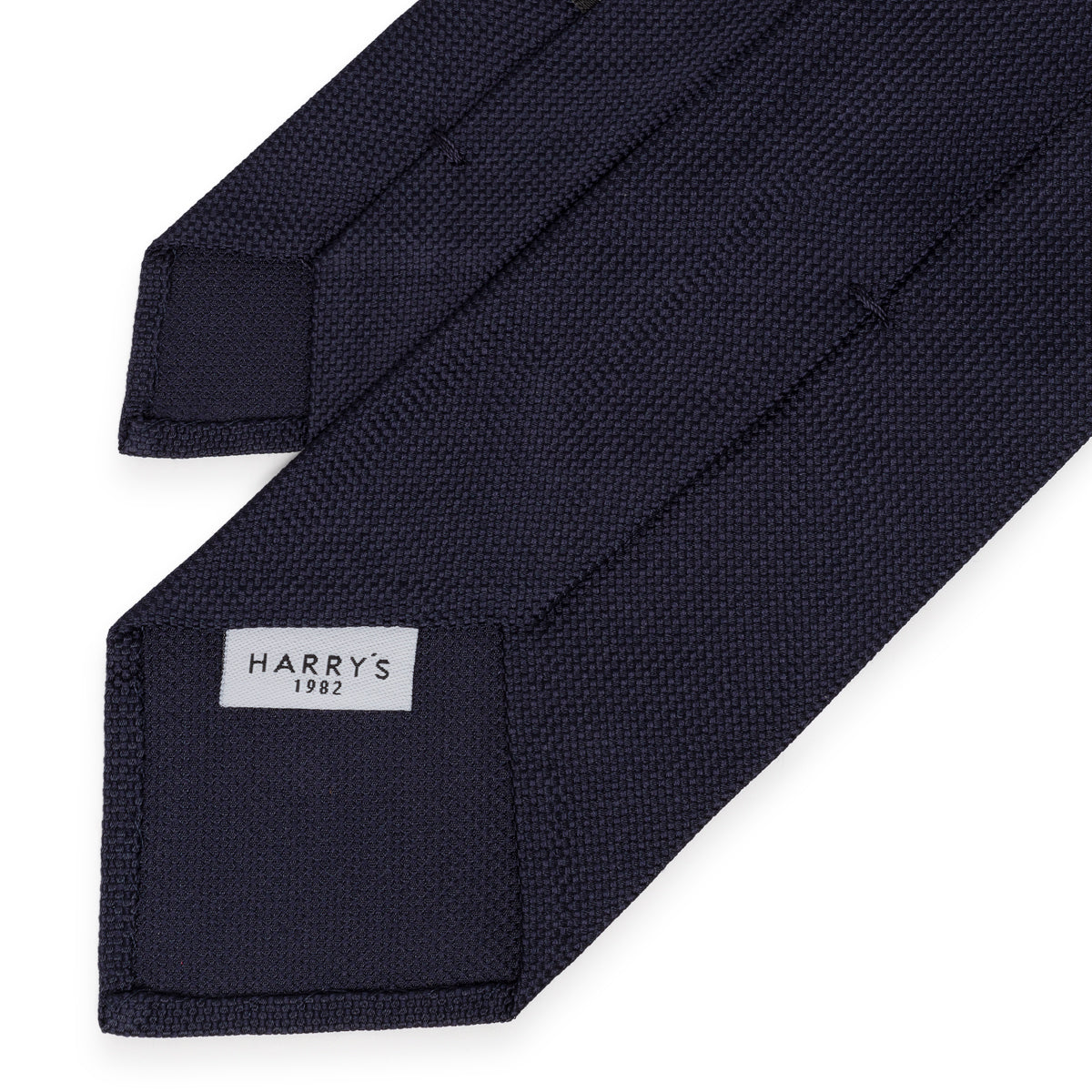 {{ tipo de producto }} CORBATA LISO SIN FORRO MARINO - Harrys 1982